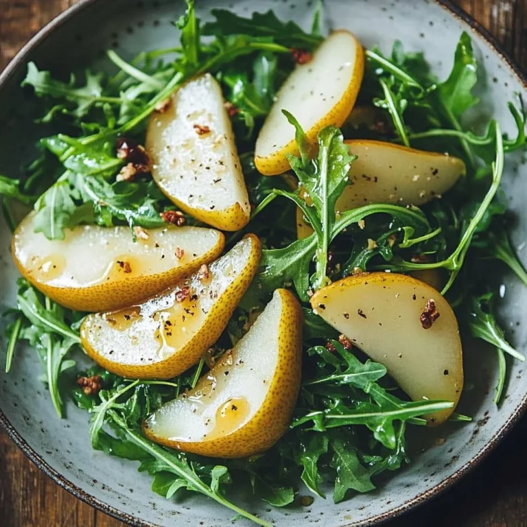 Delicious pear arugula salad with honey vinaigrette dressing
